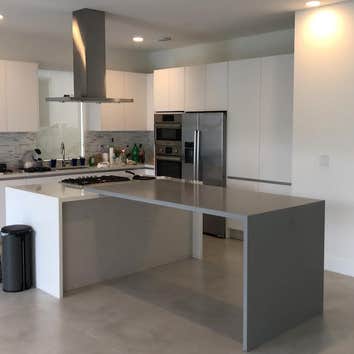 KITCHEN/COUNTERTOP RENOVATION Complete Cabinetry Installation and new Countertop Installation. Backsplash included.