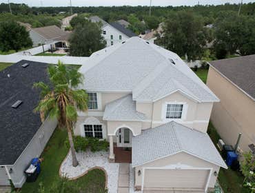 Photos by WOODSTONE ROOFING