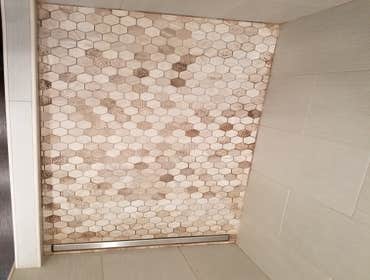 V. Jones Bathroom/Laundry Room Remodel - Tub to Step-in Shower Conversion with Linear Drain
- New Vanity, Toilet, Sink, mirror, toiletries
- All new fl
