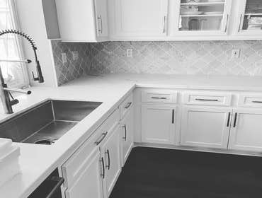 Photos by Structural Prime Builder #16 COMPLETE REMODEL
NEW COUNTER TOPS BACK SPLASH, PAINT
BATHROOMS, FLOORING CARPET. DRYWALL CABINETS INSULATION 