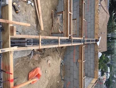 Mount Washinton Hillside land development including caissons/piles, grade beams, CMU block walls, retaining walls. All known as foundation and structur