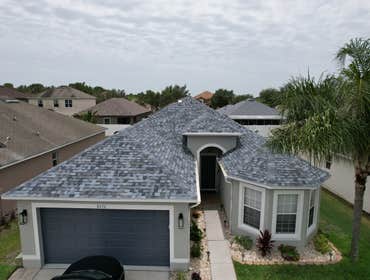 Photos by WOODSTONE ROOFING
