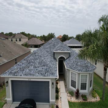 Photos by WOODSTONE ROOFING
