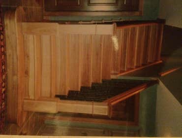 Staircase and rails with iron balusters
