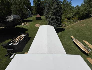 Photos by Ideal Roofing LLC #1 Complete rebuild of an old train caboose that had a rotten roofing frame and deck.
