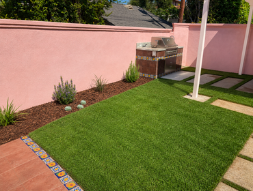 Photos by Eliteblvd Construction #16 This backyard remodel transformed an unfinished construction area into a clean, functional outdoor living space. T
