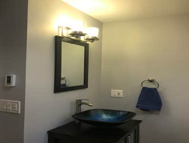 Photos by Unbeatable Electric #1 Complete bathroom remodel. Installed radiant floor heat, blue tooth speaker system with night light and regular light.