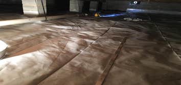 Crawlspace care Customer contacted us to clean and upgrade the appearance of crawlspace. New vapor barrier, wiring clean-up, replace failed insulation.