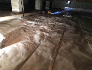Crawlspace care Customer contacted us to clean and upgrade the appearance of crawlspace. New vapor barrier, wiring clean-up, replace failed insulation.