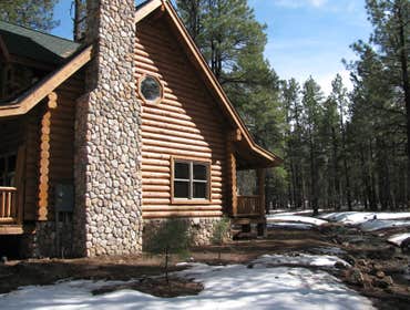 Custom Log Cabin Completed all construction tasks on custom log cabin besides log raising, including floor, roof, and interior wall framing. Separate t