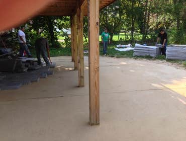 PAVER PATIO AND STONE VENEER PIERS INSTALLATION OF HALF MOON PAVER PATIO WITH STONE VENEER PIERS