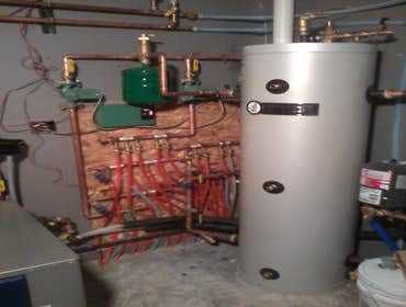 Double V Builders, Llc Project New home with a geo thermal heated floor