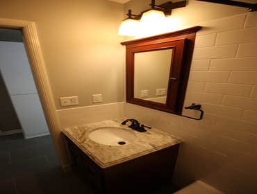 House Remodel in St. Louis Park Remodeled Bathroom and Mudroom. Installed Non-existent garage service door. Removed side door and replaced with small w