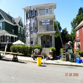 Porches built siding going up