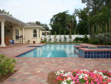 Photos from Pool Pros Inc In-ground swimming pools, spas, outdoor kitchens, travetine tile decks, brick pavers, stone patios, deck jets, LED lighting, 