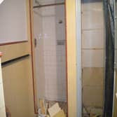 Bathroom remodel Complete tear down and build up of a bathroom including installation of a custom 7 foot shower stall with double shower heads