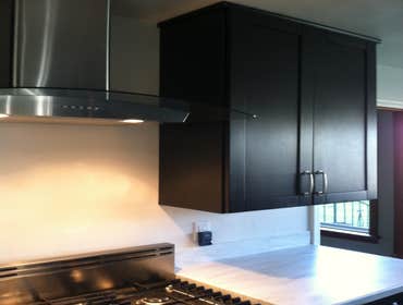 Photos by PS Carpentry LLC #1 The kitchen pictures, I hung and placed cabinetry in a galley kitchen. The deck pictures, we removed a couple beams and 