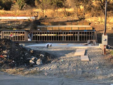 Photos by Brickhouse Construction, Inc #5 Helical Anchor Foundation, Concrete Grade Beam and Garage Slab.