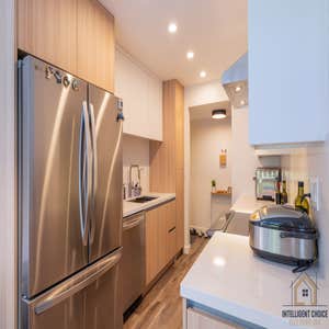 Kitchen Remodeling In Palo Alto Kitchen remodeling in Palo Alto: a beautiful transformation featuring natural tones and upgraded appliances.