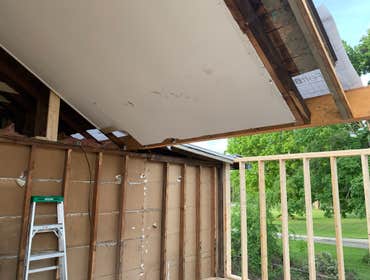 Photos by C.S Remodeling & Construction #1 Dust protection and entry to home protection temporary wall built to prevent anyone or anything from getting