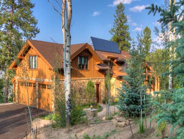 Red Sky Solar Full remodel including solar heating, hot water and hot tub. See write up at this link.
http://mechanical-hub.com/sites/hydronics/sol