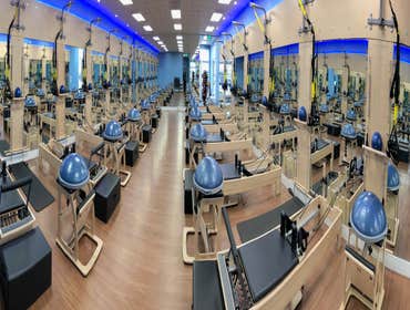 Club Pilates - Novato Tenant Improvement to transform old HR Block into a Club Pilates. 12 Reformers, lots of LED lighting and a fun filled environment
