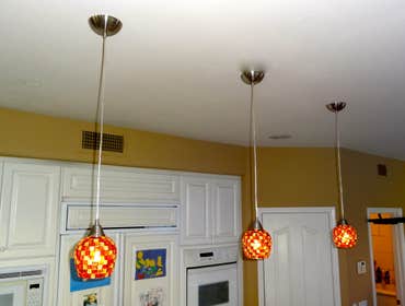 Carlsbad, Ca, kitchen pendants over Islands, and Dining chandalier. This are beautiful kitchen lights in Carlsbad California, we collaborated with the 