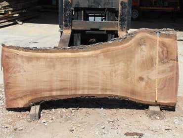 Sawmill and custom wood Sawmill owned and operated by Murphy Construction Design. Custom cut wood to clients specifications.