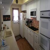 Becerra Kitchen Paint & Kitchen remodel While using existing Corain counter tops.
