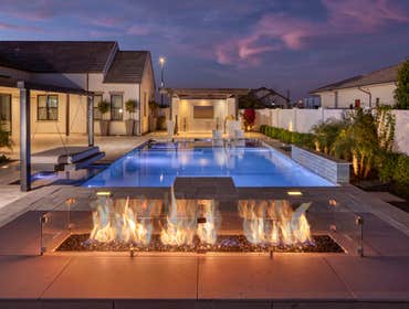 Complete Gilbert Backyard This custom backyard project in Gilbert, Arizona showcases a clean, modern design built around both relaxation and entertainm
