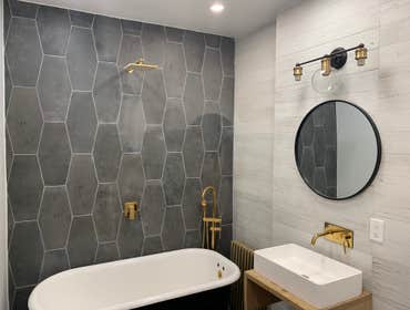 Walk-in bathroom walk-in bathtub With Floating sink , and tank less toilet .