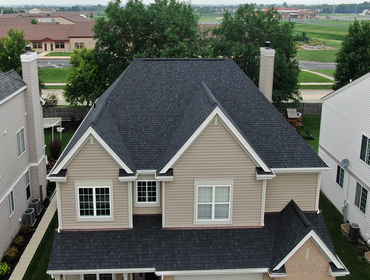 Roofing Project in Huntley, IL We installed Oynx Black shingles for this lovely homeowner in Huntley, IL.
