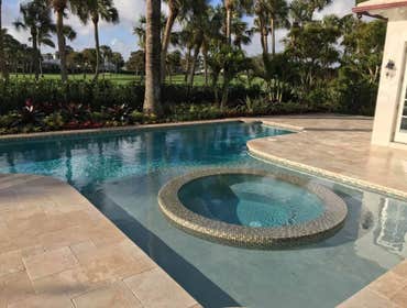 Photos by Oasis Pools and Pavers #1