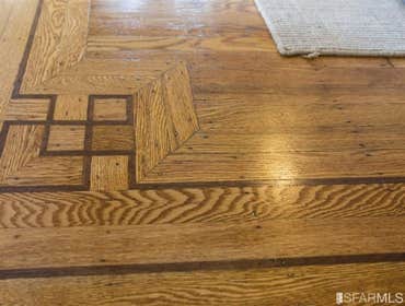 Refinished red oak, top nail, with inlay, Pacifica, CA
