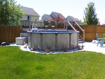 Waukee Pool Deck 250 square feet composite deck and railing around above ground pool.