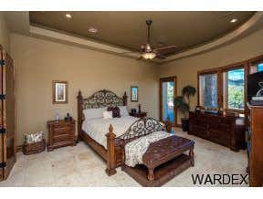 Photos by Sequoia Homes LLC #1 This Tuscan/Mediterranean style home is truly one of Mohave County's finest luxury homes. Over 1 acre of property in the