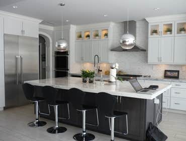Great Room Creating a great room in Ladera Ranch included adding beam and removing the walls that separated the kitchen, dining and living rooms. White