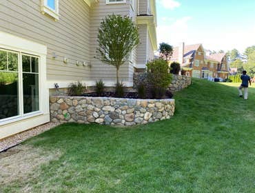 Wayland Hidden Springs Lane This is a new build construction where we did all of the masonry and hardscape work. Part of our scope was the fieldstone r