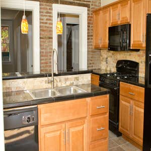 Stephen M Daniel Jr Construction Project 1 Custom built and designed bathroom sink, Adjacent shower, and Kitchen. These were all done in a 100 + yr...