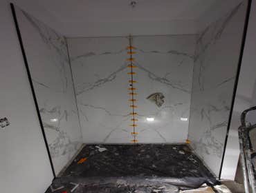 SLAB TILE INSTALLATION PROGRESS
