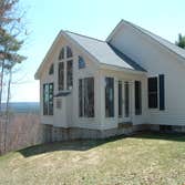 Casco Project 4 season sunroom, heated tile floors, pine interior.
