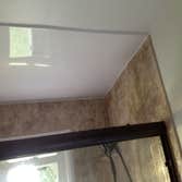 Tub to Shower done right - Greenville Pa. We removed a 54" tub with a center drain, the scabbed in plumbing wall, the bad tile job and the bad vinyl wi