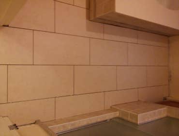 Ditra-Heat floor warming/Tile Floor Upstairs master bathroom floor. Ditra membrane with Ditra-Heat floor warming cable. 12"x24" porcelain tile on subwa