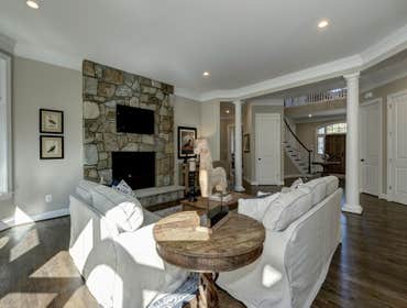 GULICK | CUSTOM Home in McLean The impressive stone and HardiePlank® elevation on our Winthrop really stood out on this corner lot of approximately one
