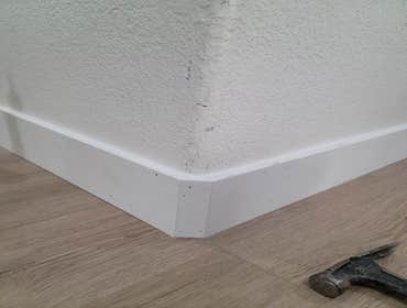 Fine Design Remodeling resume painting, frame, tile, cabinet install, shower, more.