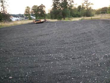 Photos by Zack of All Trades LLC #2 100'x100' parking lot, top with screened asphalt to be sealed in summer time.
