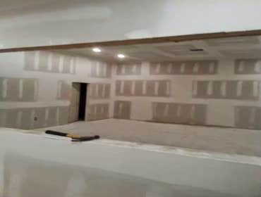 drywall installation before paint