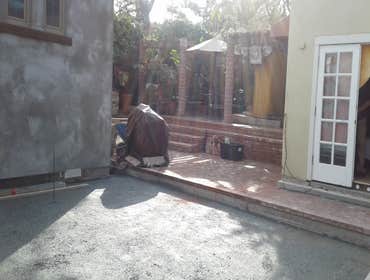 Photos by Whole Earth Construction #1 Large two story addition with brick patio and stone retaining wall.