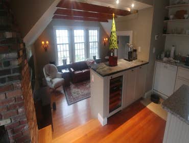 Cataumet MA Open wall from kitchen to sun room to enjoy the beautiful view. Attic renovation to get lots of usable, space.