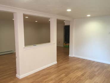 Basement & Bathroom Build-Out in Malden Basement flooring all brand new and great during and after photos for the bathroom! If you're in need for eithe